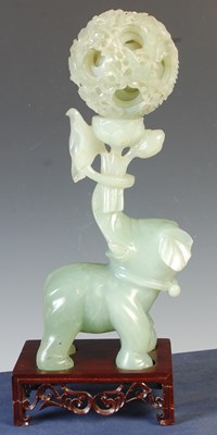 Lot 386 - A Chinese green stone carving of an elephant...
