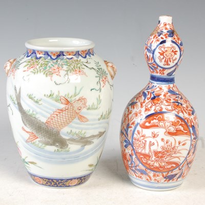 Lot 407 - A Japanese Imari porcelain double gourd vase,...