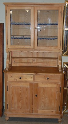 Lot 750 - A vintage pine dresser, the upper section with...