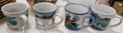 Lot 450 - Four assorted Highland Stoneware mugs.