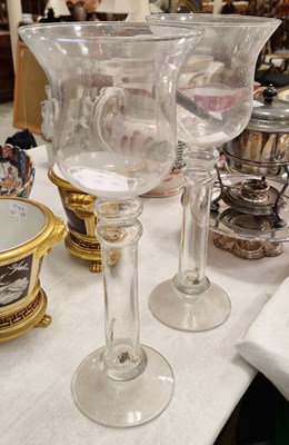 Lot 455 - A pair of clear glass hurricane lamps, 35cm high.