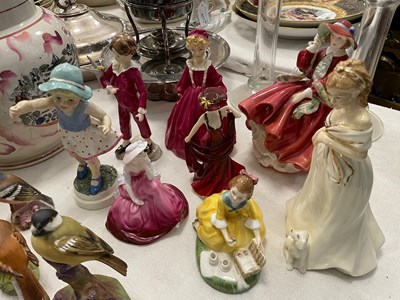 Lot 457 - A collection of assorted ceramic figures to...