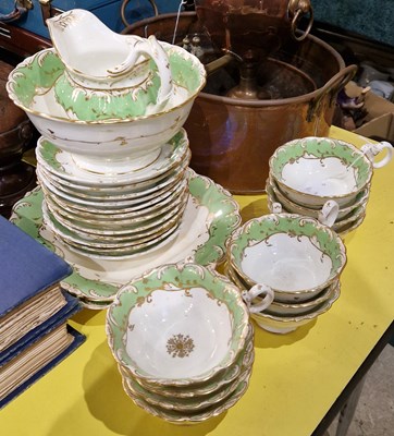 Lot 472 - A 19th century green ground part tea set with...