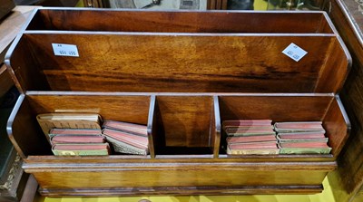 Lot 489 - A stained wooden stationery rack, containing...