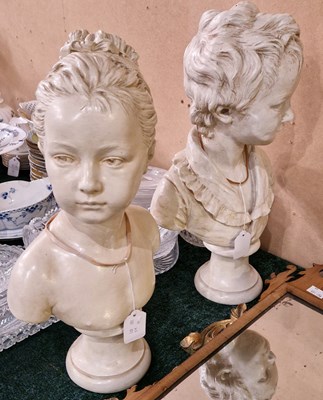 Lot 504 - A pair of off-white painted terracotta busts,...