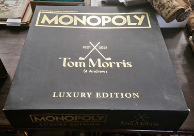 Lot 512 - Golfing Interest - a boxed Monopoly board game,...