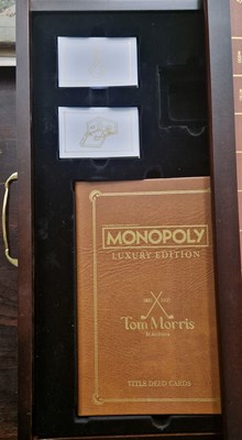 Lot 512 - Golfing Interest - a boxed Monopoly board game,...