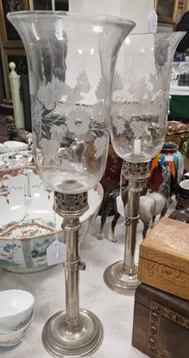 Lot 546 - A pair of white metal and clear glass...