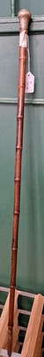 Lot 661 - A London silver mounted bamboo walking cane.