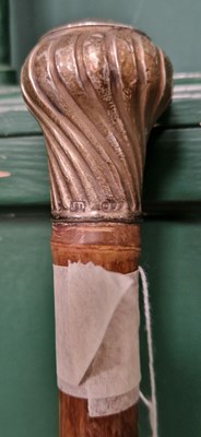 Lot 661 - A London silver mounted bamboo walking cane.