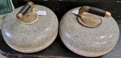 Lot 679 - A pair of vintage granite curling stones with...