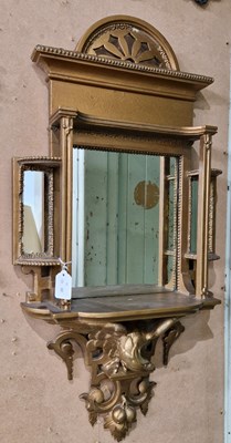 Lot 758 - A gilt framed wall mirror with open bracket...