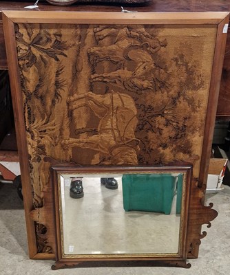 Lot 760 - A mahogany framed fret cut wall mirror in the...