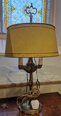 Lot 764 - A brass and tolware style two-light table lamp...