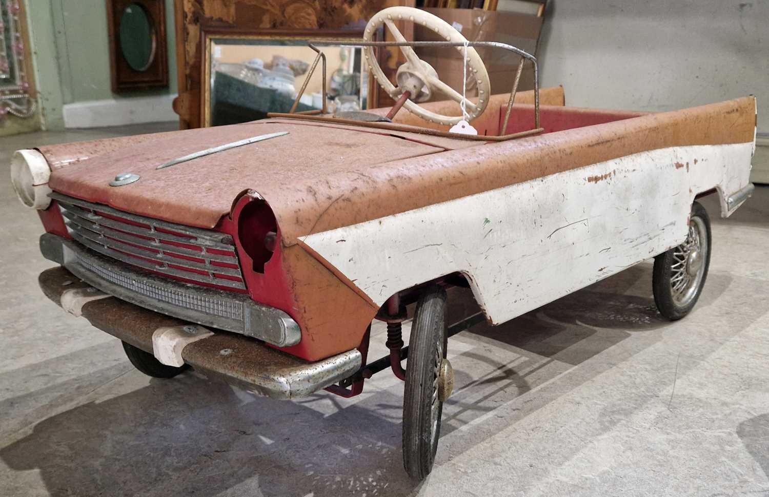 Lot 770 - A vintage Tri-ang peddle car, approximately...