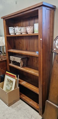 Lot 782 - A modern open bookcase of five shelves,...