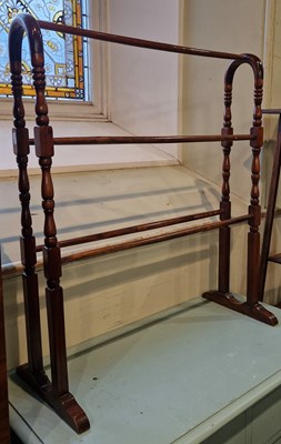 Lot 787 - A mahogany towel rail, 90cm high