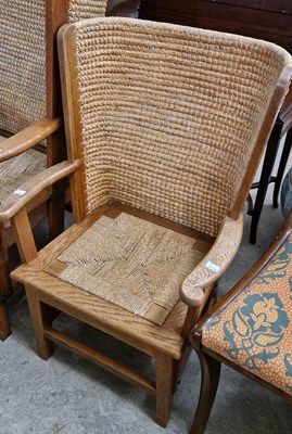 Lot 797 - An early 20th century childs oak Orkney chair...