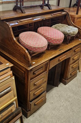 Lot 800 - An oak roll-top desk with serpentine tambour...