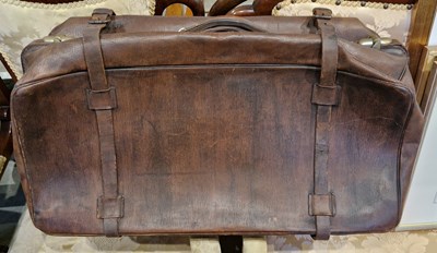 Lot 813A - A vintage brown leather and brass bound...