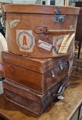 Lot 823 - A vintage brown leather ladies hat box with...