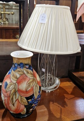 Lot 836 - A decorative table lamp and shade, 49cm high;...