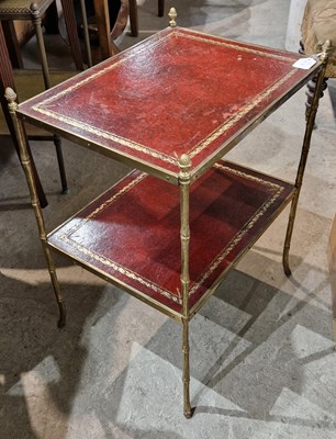 Lot 840 - A brass and red leather faux bamboo two-tier...