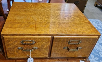 Lot 877 - An early 20th century oak tabletop two drawer...