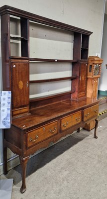 Lot 878 - A George III oak dresser, the upright back...