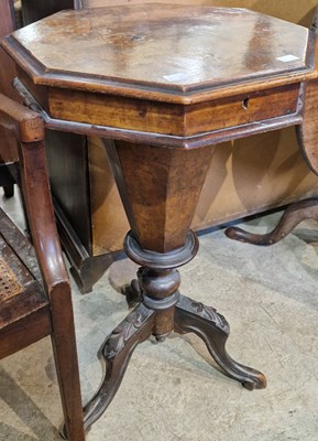 Lot 894 - A Victorian walnut octagonal shaped work table,...