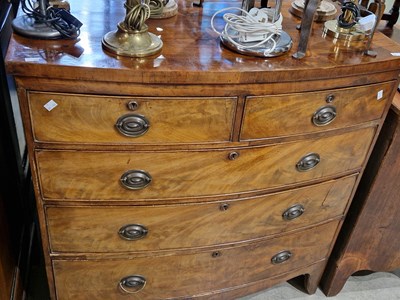 Lot 899 - A 19th century mahogany bowfront chest of two...