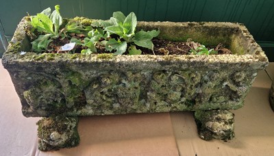 Lot 929 - A composite stone rectangular planter on two...