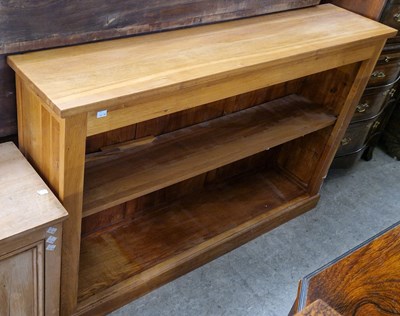 Lot 947 - A modern oak open bookcase with one adjustable...