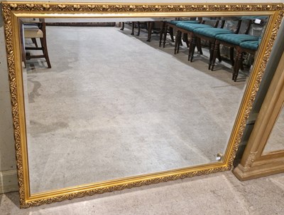 Lot 978 - A gilt framed rectangular bevelled overmantle...