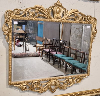 Lot 979 - A gilt framed rectangular bevelled overmantle...