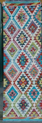 Lot 1005 - A Chobi Kilim runner, the beige ground...