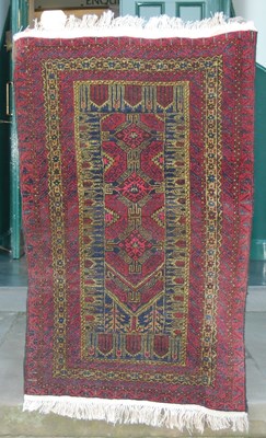 Lot 1006 - A Persian madder ground prayer rug, the...