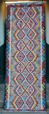 Lot 1007 - A Chobi Kilim runner, the beige ground...