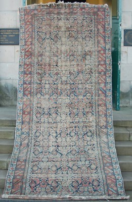 Lot 1011 - A late 19th / early 20th century Persian rug,...