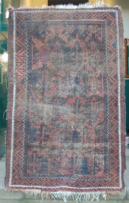 Lot 1012 - An antique Persian rug, the earth coloured...