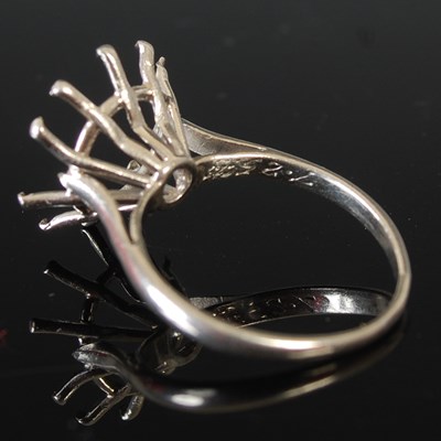 Lot 306 - A 9ct white gold ring, size M, 6.1 grams;...