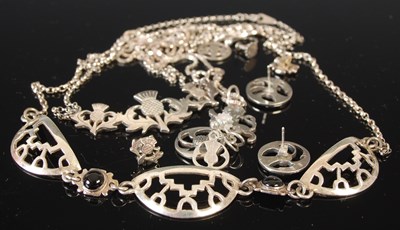 Lot 310E - A collection of Scottish silver jewellery to...