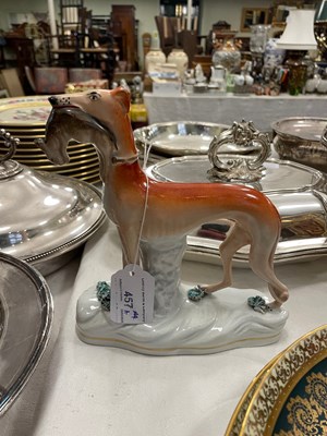 Lot 457A - A Staffordshire pottery figure of a greyhound...