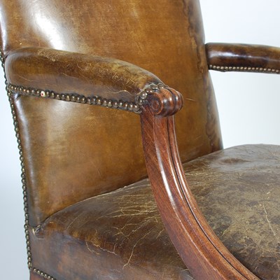 Lot 90 - A George III mahogany Gainsborough chair, the...