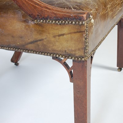 Lot 90 - A George III mahogany Gainsborough chair, the...