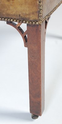 Lot 90 - A George III mahogany Gainsborough chair, the...