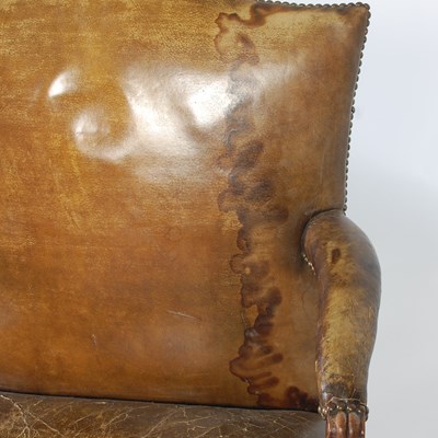 Lot 90 - A George III mahogany Gainsborough chair, the...