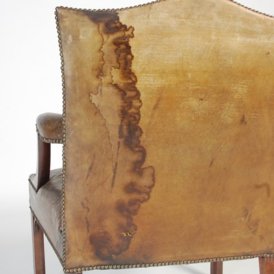 Lot 90 - A George III mahogany Gainsborough chair, the...