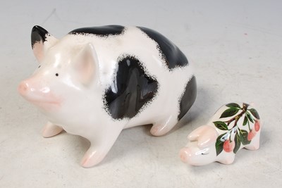 Lot 2 - A Griselda Hill Wemyss pottery model of a pig...