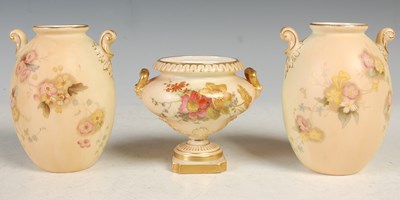 Lot 4 - A pair of Royal Worcester ivory ground twin...